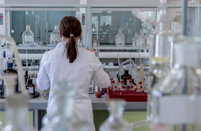 Female scientist working on an experiment in a laboratory.